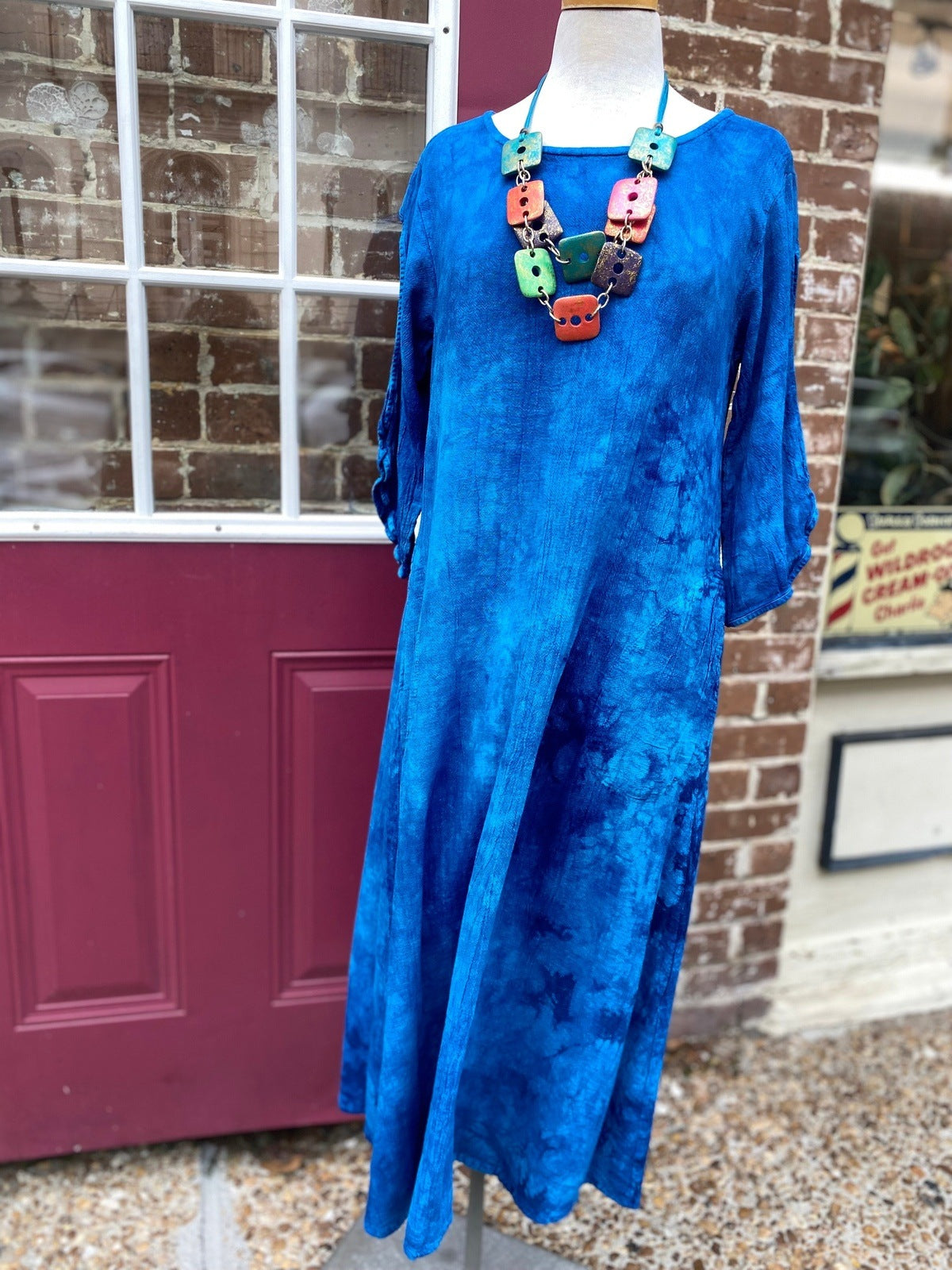 Eva Peek-a-Boo Sleeve Dress